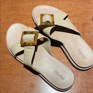 OluKai Women's Sandals in Cream with Amber Buckle